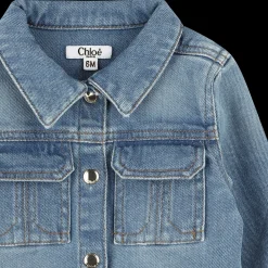 Denim jacket with press studs