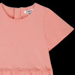 Flared dress with scallops