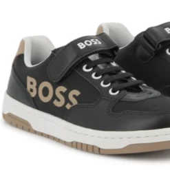 Laced hook-and-loop trainers