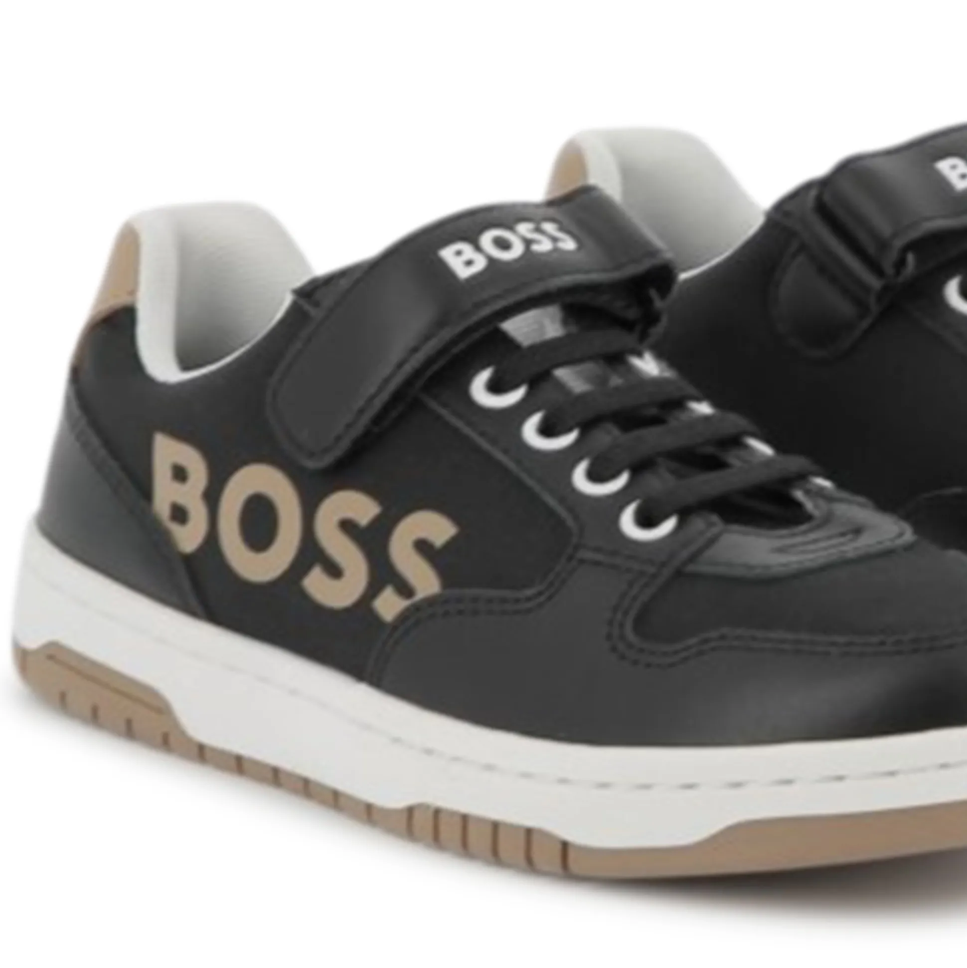 Laced hook-and-loop trainers