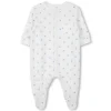 Pyjamas with snap fasteners