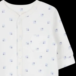 Pyjamas with snap fasteners