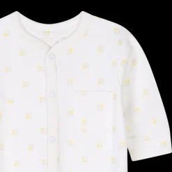 Pyjamas with snap fasteners