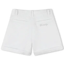 Shorts with metal plaque